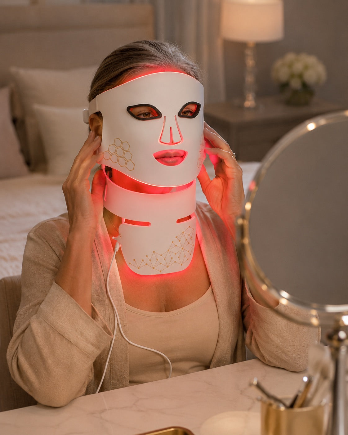 Woman fitting the white Rebound Halo face mask and dedicated neck attachment in front of a mirror